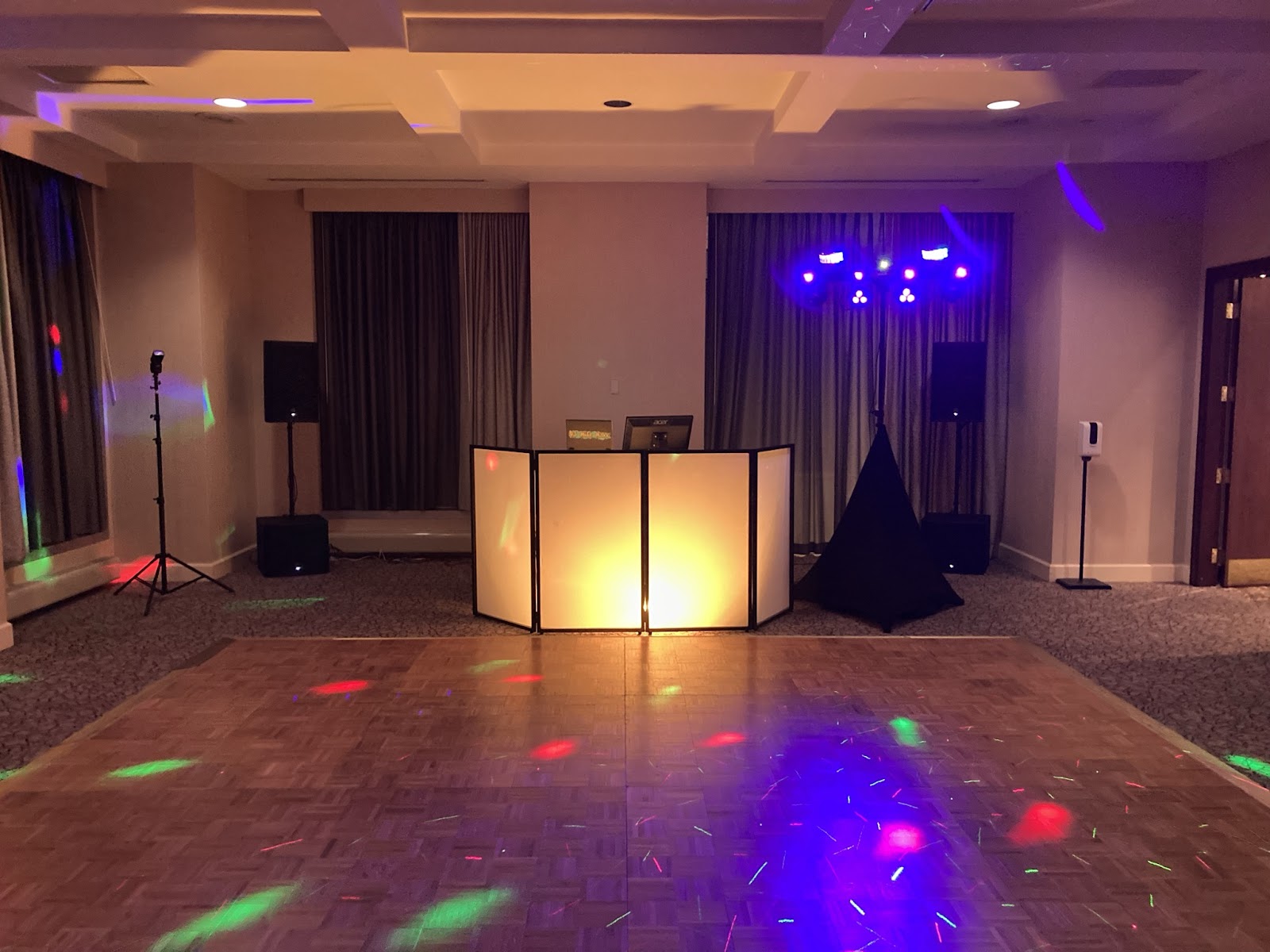 Premier Wedding DJ lighted booth set up at wedding