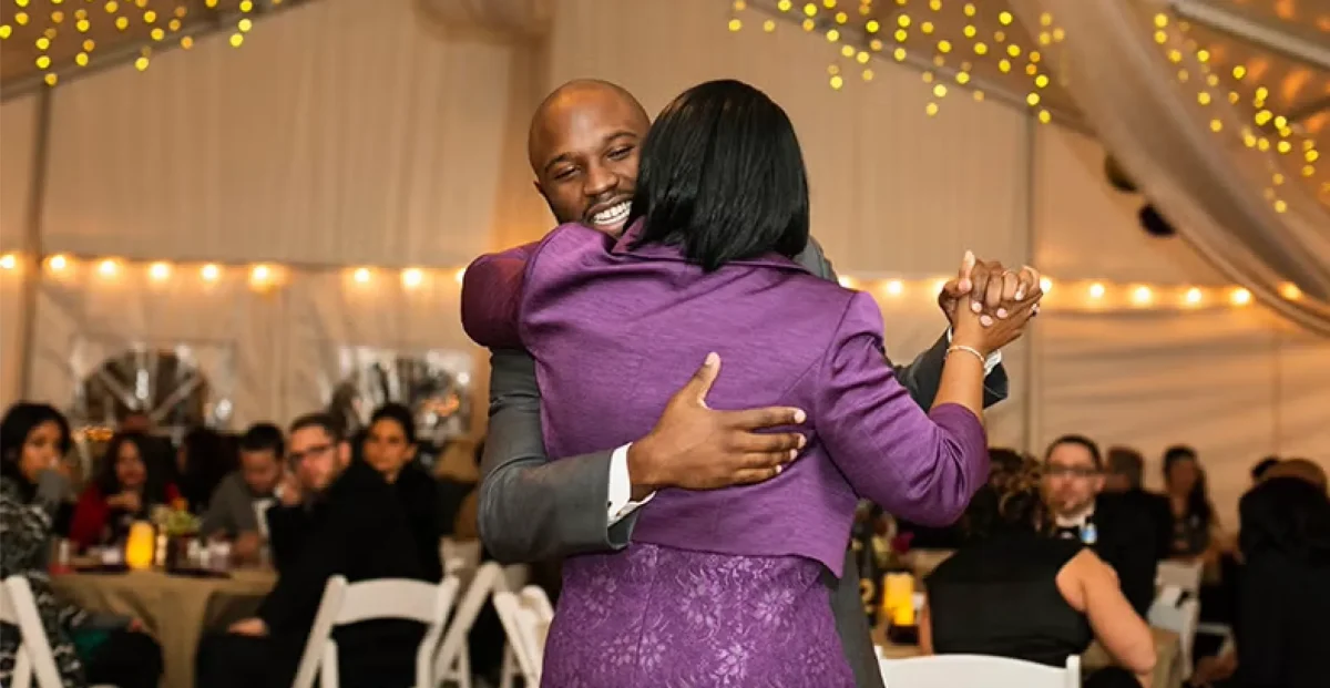Groom dancing with his mother to the best mother-son wedding dance songs