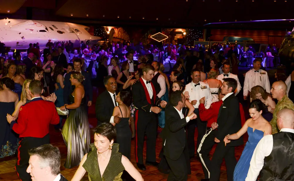 packed charity event dance floor