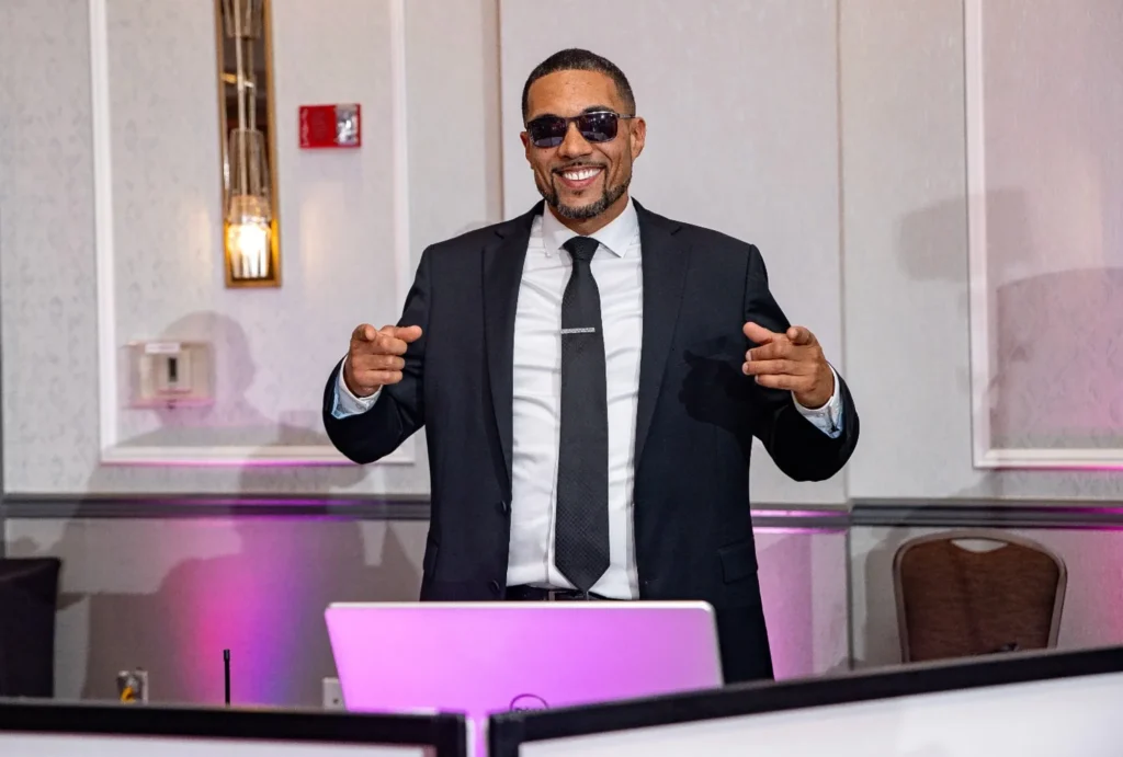 Premier Wedding DJ behind the DJ Booth